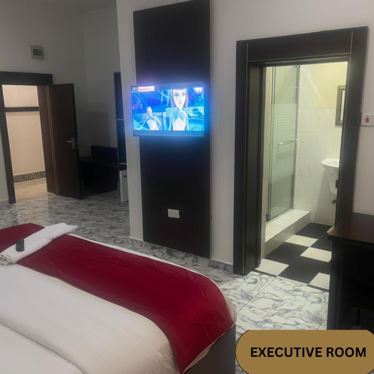 Executive Room kitchenette with kettle and tea set at Grand Chizet Hotels & Suites